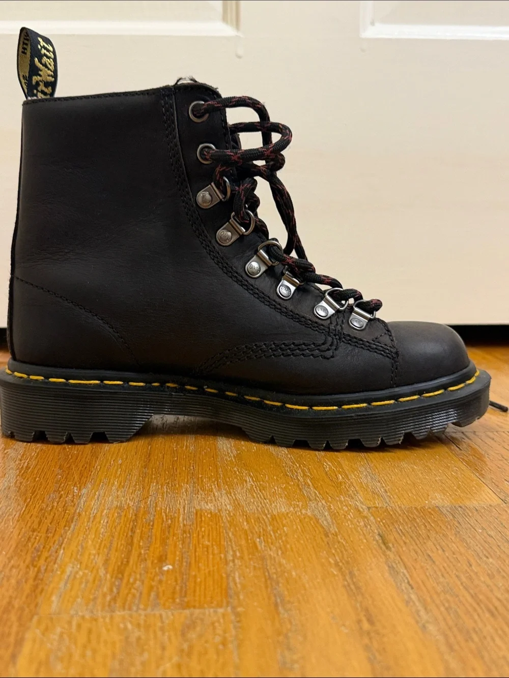 Dr. Martens Black Leather Hiking-Style Boots with Yellow Stitching